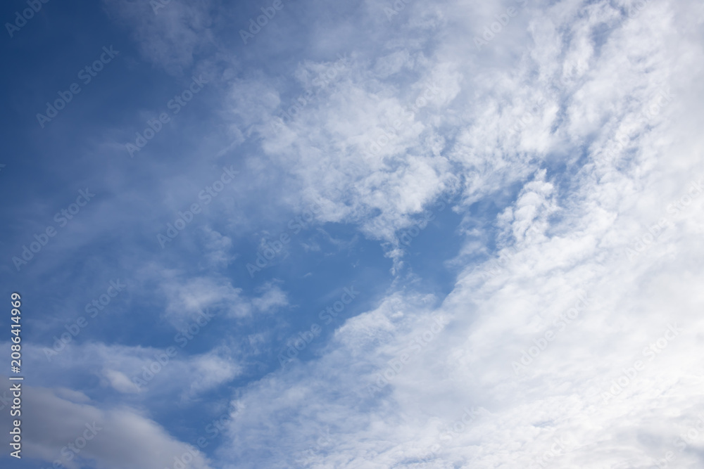 Obraz premium Blue sky white cloud cloudscape sunlight weather nature atmosphere background with soft cirrus pattern and bright morning light calm airy mood ample copy space