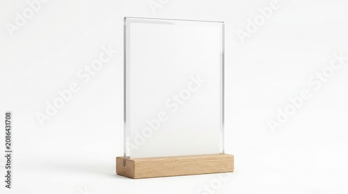 Empty acrylic sign holder with a wooden base standing on a clean white background in studio light