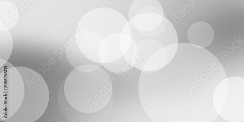 Tableau sur toile Abstract background featuring soft circular bokeh lights in white and grey gradients creating elegant smooth modern visual effect