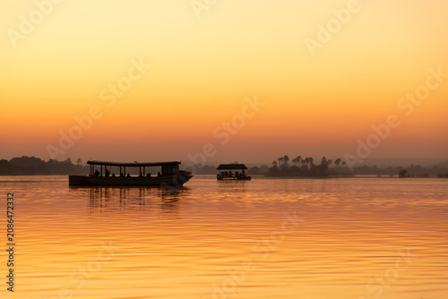 Canvas Print vintage boast on the Zambezi River at sunrise, Zimbabwe, Africa