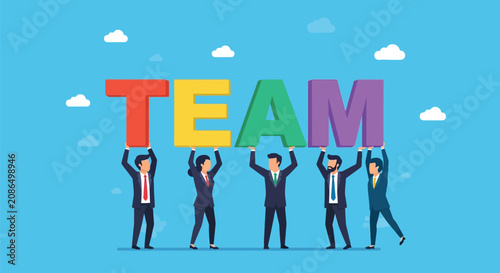 Принти на полотні Diverse business team holding up large colorful letters spelling team against blue sky background representing collaboration and collective group success
