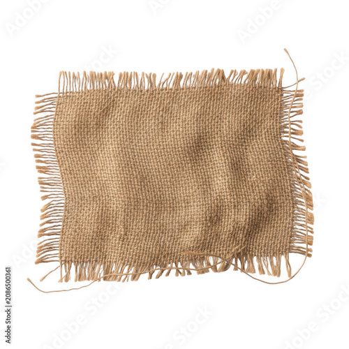 A Rectangular Piece Of Natural Brown Burlap Fabric With Frayed Raw Edges
