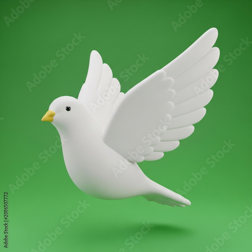 White dove in flight on green background
