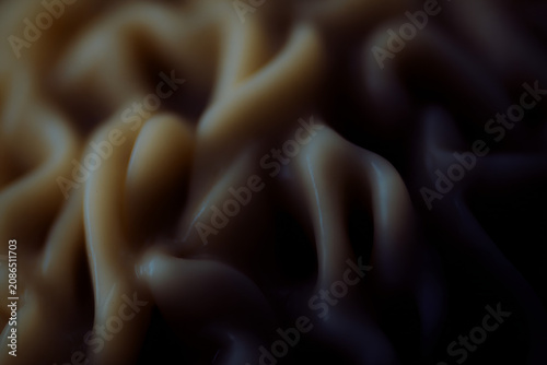 Abstract swirling patterns of light and shadow creating a mesmerizing organic texture.
