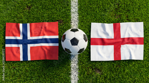 Foot Ball with Norway and England Flags Flat Lay on Grass