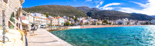 Town of Petrovac beach and waterfront panoramic view