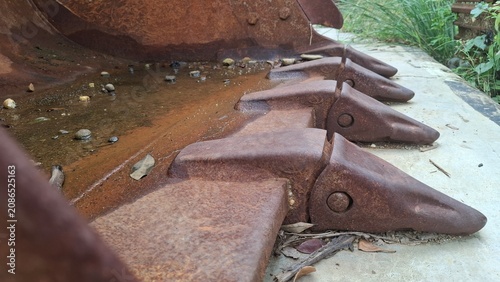 Rain drops on rusty corrugated metal surface