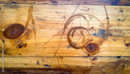 Rustic Wooden Plank with Natural Knots and Circular Stain Marks