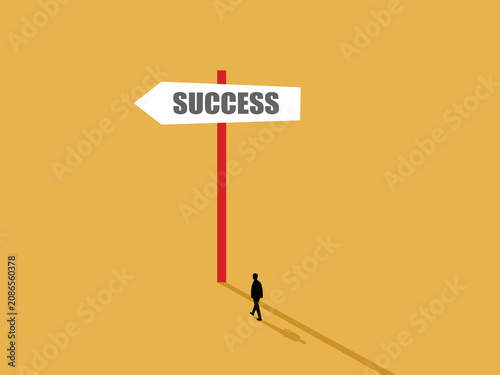 businessman successfully discovered a road sign