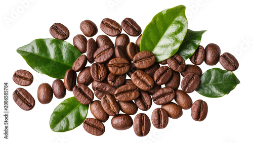 Roasted coffee beans with green leaves