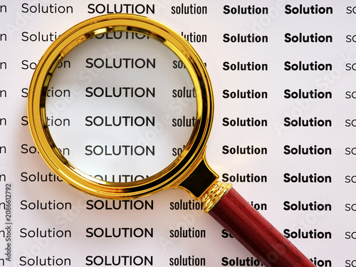 Canvas Print Magnifying glass highlighting solution text for discovering answers