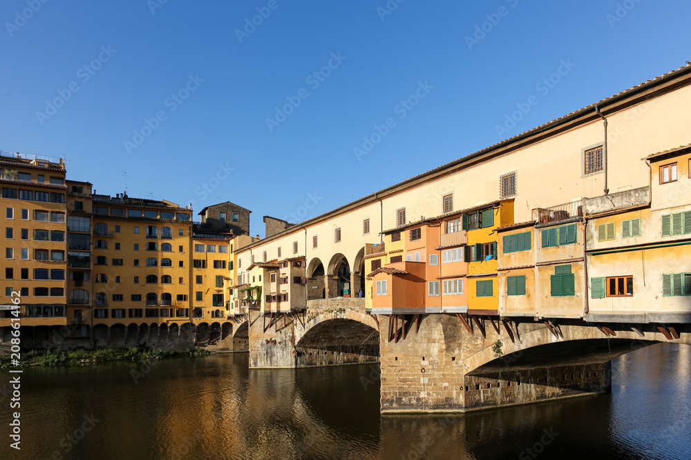 Fototapeta premium Ponte Vecchio bridge over Arno River in Florence, Tuscany, Italy