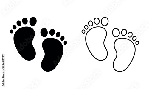 Black and white footprints of baby and adult on plain surface