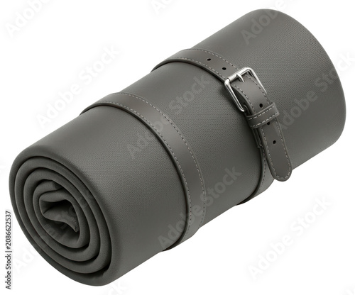 Rolled gray leather mat secured with straps over transparent background