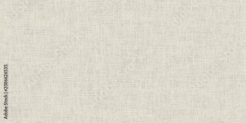 фотографія A textured, light beige fabric, possibly linen or a similar natural fiber, displays a subtle, woven pattern