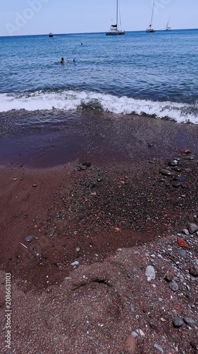 Scenic red beach seascape in akrotiri, santorini, greece