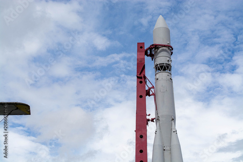Fényképezés Space rocket on launch pad against blue sky
