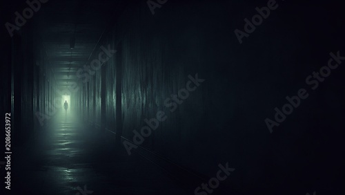 Man standing at end of dark misty corridor with glowing light. Mysterious scene in gloomy hallway representing horror, loneliness, afterlife or unknown journey. Surreal atmospheric concept.