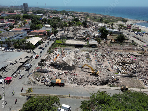 Photos A drone view shows collapsed buildings in the aftermath of the June 24 earthquakes in La Guaira, Venezuela, as damage assessment efforts continue