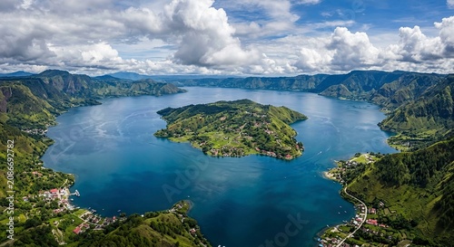 Panoramic Aerial View of Lake Toba and Samosir Island with Green Hills and Village, North Sumatra