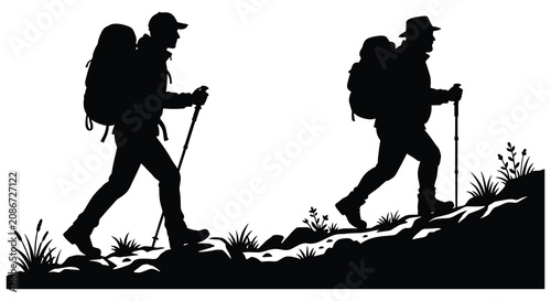 Photos Two hikers with backpacks and walking sticks depicted as a black silhouette hiki