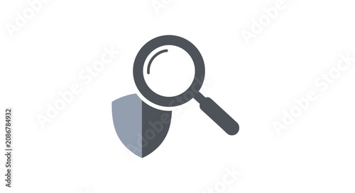 Foto Protection security shield and magnifying glass.
