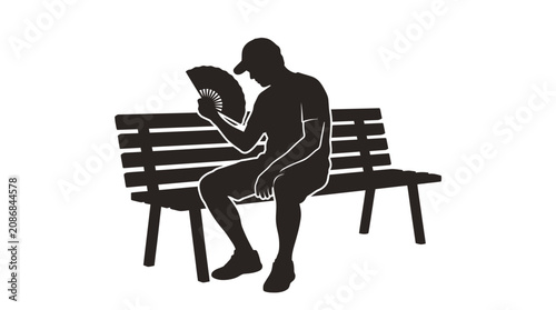 Silhouette of a man sitting on a wooden park bench holding a handheld folding fan