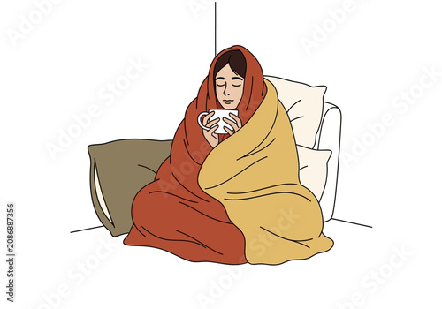 Konstfotografi Woman sitting wrapped in blanket.