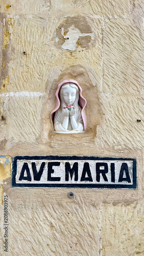 Religious Ave Maria Inscription on a Traditional Maltese Limestone Wall