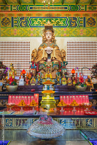 Photography Ornate shrine with a large golden Mazu statue at Thean Hou Temple in Kuala Lumpu