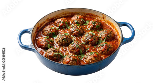 Meatballs simmering in rich tomato sauce in a blue dutch oven