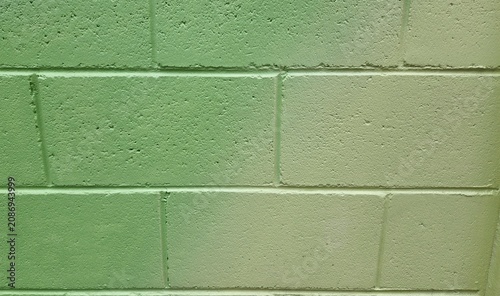Light yellowish-green concrete block wall, yellowish-green paint, yellowish-green gradient paint, concrete block wall background, painted wall background