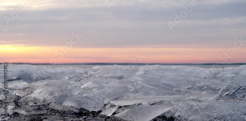 ice on the water in the light of the setting sun