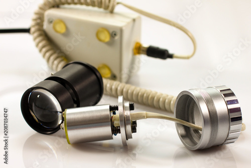Cuadro en lienzo Compact laboratory light source with brightness controller, flexible coiled cable and optical illuminator for microscopy and scientific applications