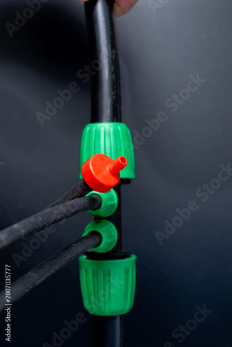 Drip irrigation system closeup of dripper