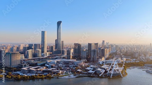 Aerial view of the skyline and Ferris wheel along Jinji Lake in Suzhou, Jiangsu Province, China