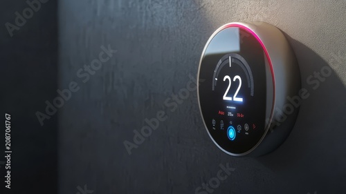 Modern smart thermostat mounted on textured wall for temperature control and home automation systems display.