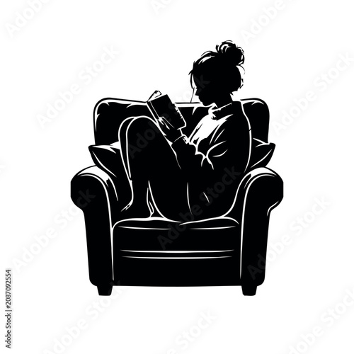 A person sitting chair and reading book