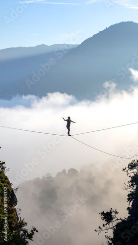 Slackline Over Clouds.