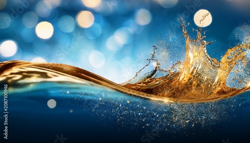dynamic water wave breaking golden liquid splash vibrant blue sparkling bokeh