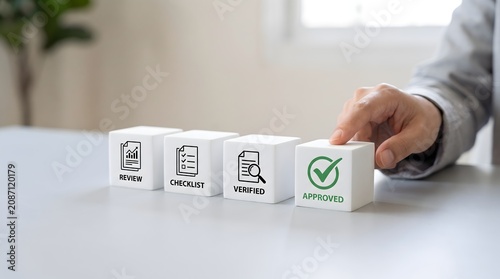 Hand places final approved cube in workflow sequence