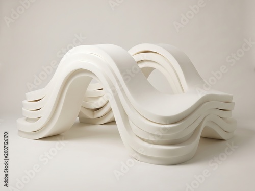 Layered white wave sculpture presents a flowing undulating form against a neutral backdrop abstract architecture art