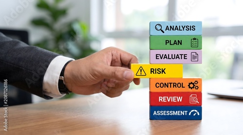 Businessman adds risk block to business process steps