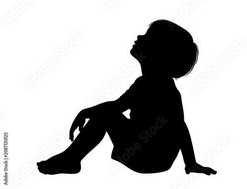 Pensive Child Sitting on Ground and Looking Up Silhouette for Kids Mental Health and Future Dream Concept
