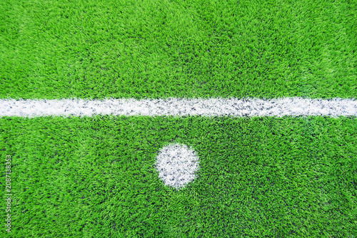 Football field artificial turf soccer field penalty mark white line creating clean sports background with vibrant synthetic grass