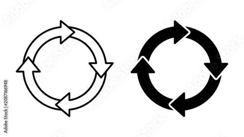Fotografía Circular Arrows Symbol: Two circular arrows symbols, one outlined in white and the other solid black, illustrate a concept of repetition and flow