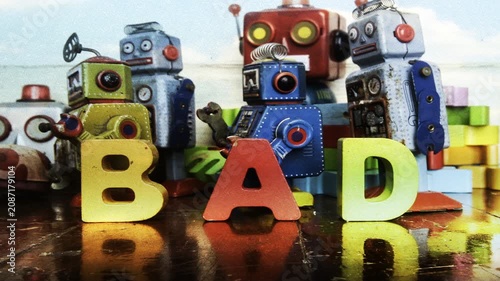  Vintage Bad Robots make the word BAD with wooden letters, stop motion 
