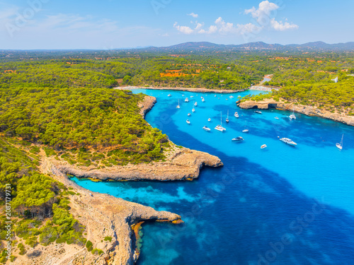 Aerial drone view of yachts and boats in Mediterranean sea bay. Summer vacati...