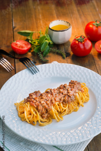 Bild auf Leinwand Creamy Pasta Dish with Basil Garnish