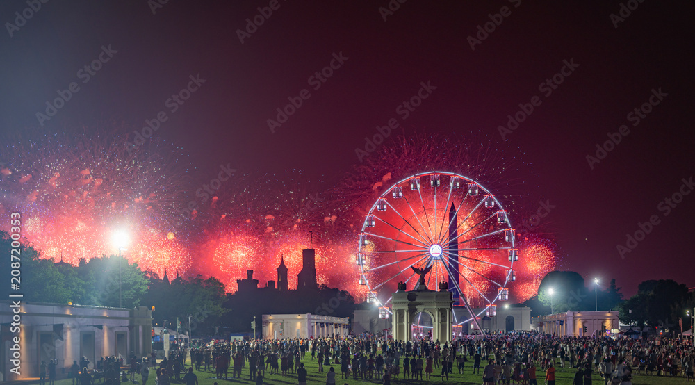Fototapeta premium Independence Day fireworks near monument. American Independence Day patriotic celebration. National Independence Day ceremony in capital. Independence Day honors American freedom.